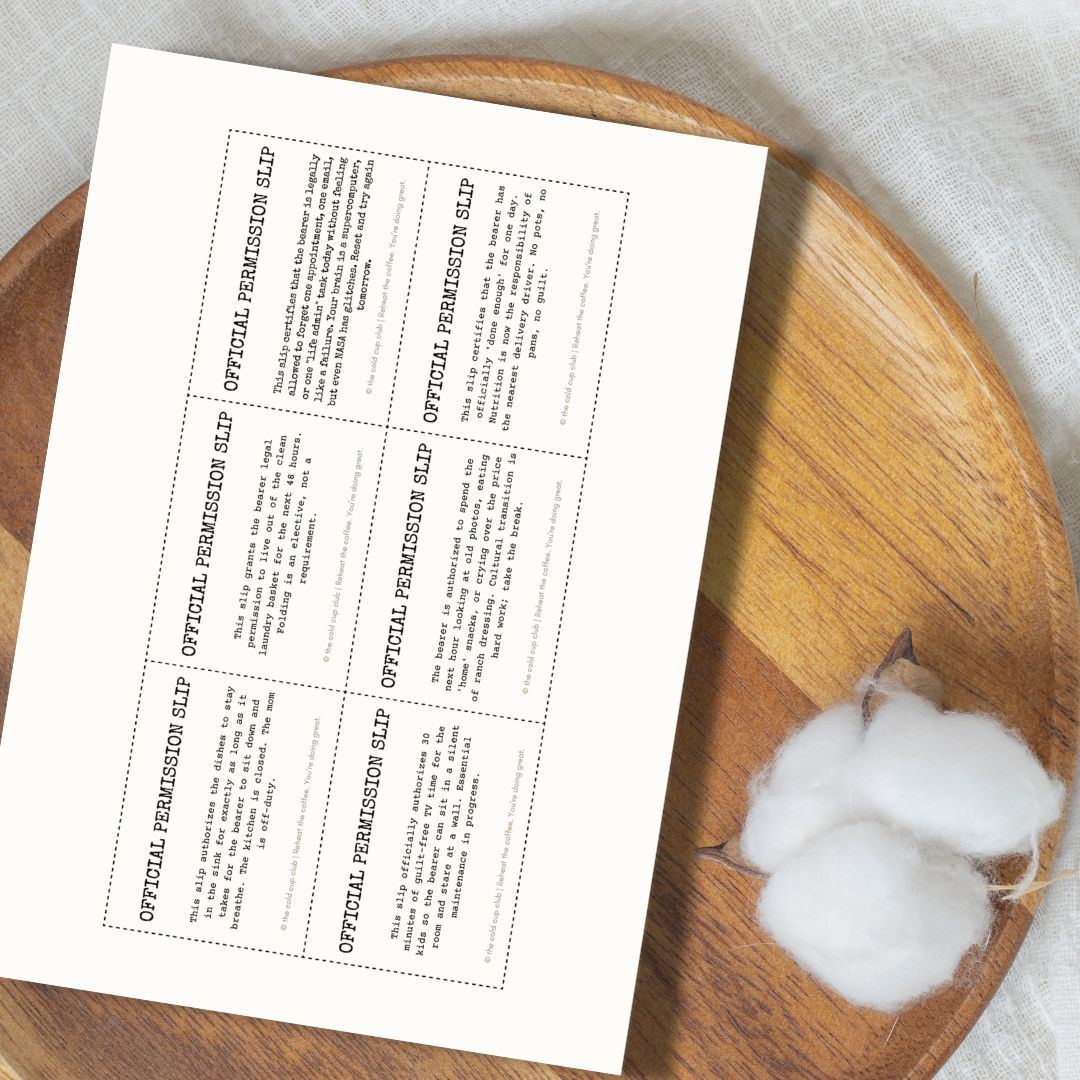 Sheet of paper with printed text on a wooden surface with cotton balls.